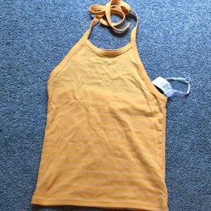 Yellow halter top.